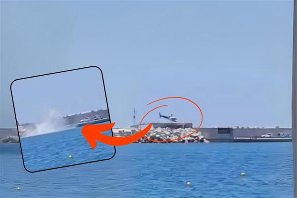 Mikonos'a gitmek isteyen 4 ABD'li turisti alan helikopter kalkışta sorun yaşayınca marinadaki teknelerin arasına düştü