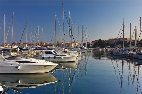 Koç Holding KAP'a yaptığı açıklamada, Göcek'teki Village Port ve Exclusive Port marinaları devralmak için anlaşma imzaladığını duyurdu